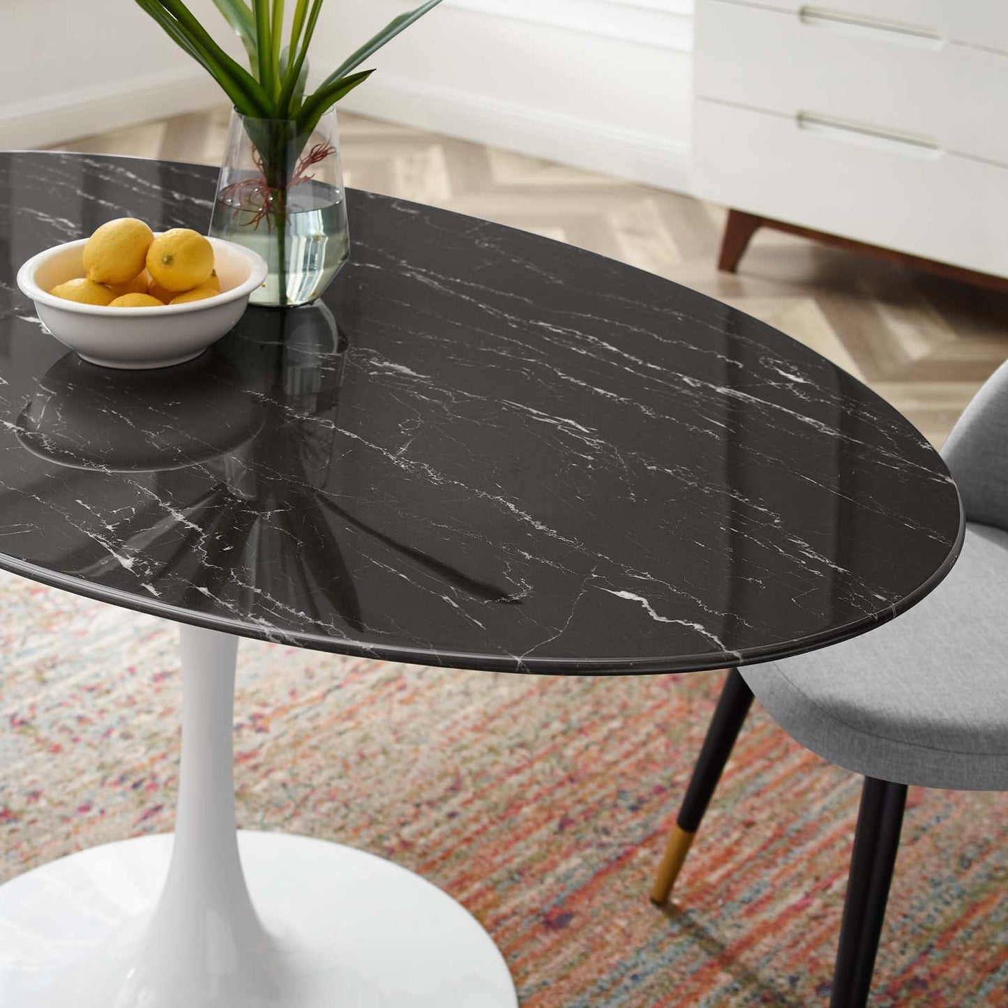 Lippa 60" Artificial Marble Dining Table in Gold Black, White Black, and White Natural